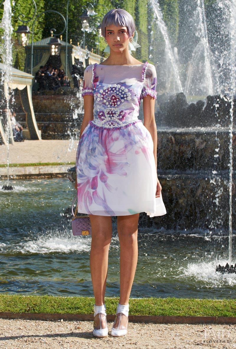 Cora Emmanuel featured in  the Chanel fashion show for Resort 2013