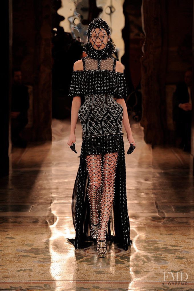 Karlie Kloss featured in  the Alexander McQueen fashion show for Autumn/Winter 2013
