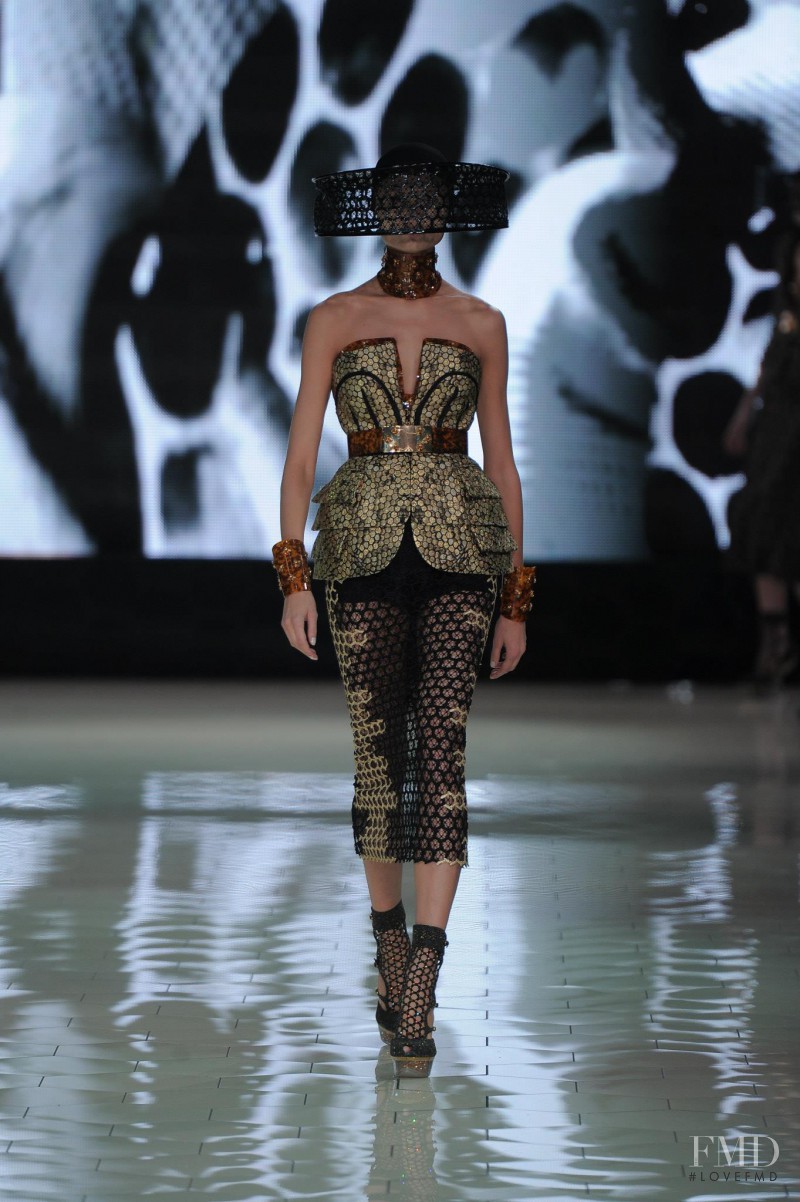 Magdalena Frackowiak featured in  the Alexander McQueen fashion show for Spring/Summer 2013