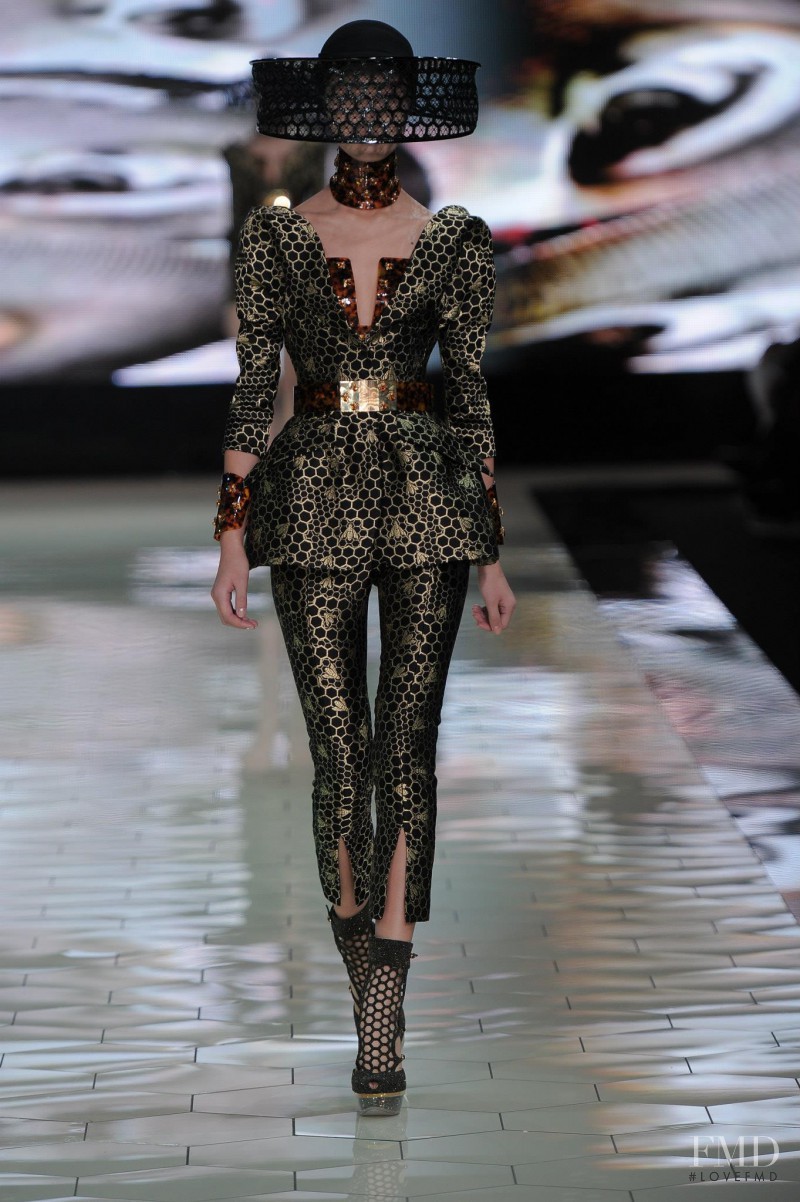 Tian Yi featured in  the Alexander McQueen fashion show for Spring/Summer 2013