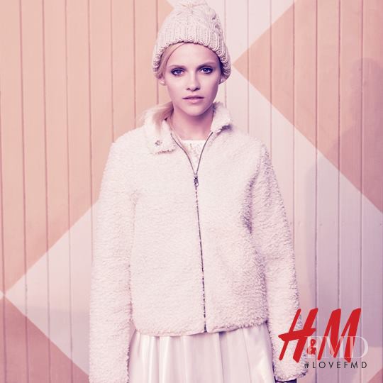 Ginta Lapina featured in  the H&M Divided Divided - A Carnival Story advertisement for Fall 2013