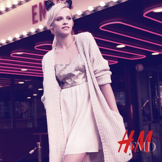 Ginta Lapina featured in  the H&M Divided Divided - A Carnival Story advertisement for Fall 2013