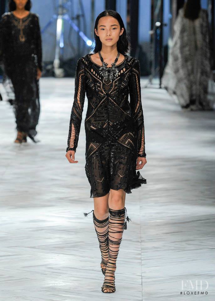 Xiao Wen Ju featured in  the Roberto Cavalli fashion show for Spring/Summer 2014