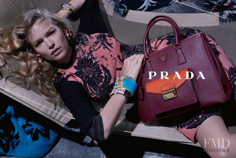 Anna Ewers featured in  the Prada advertisement for Resort 2014