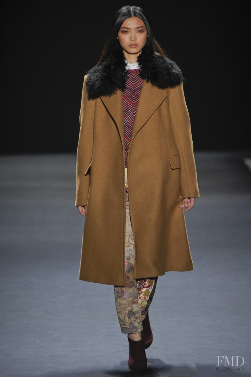 Tian Yi featured in  the Vivienne Tam fashion show for Autumn/Winter 2012