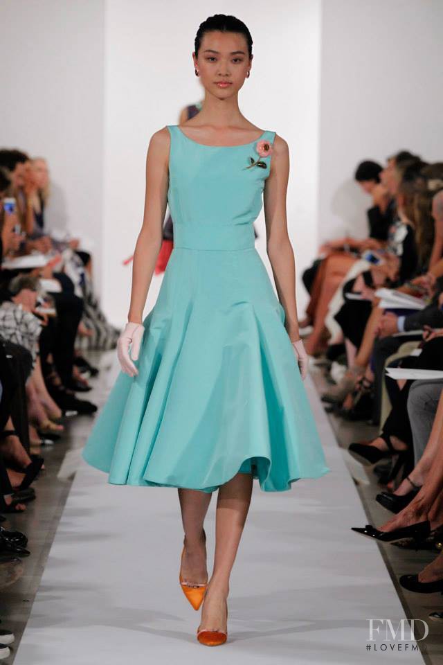 Tian Yi featured in  the Oscar de la Renta fashion show for Spring/Summer 2014