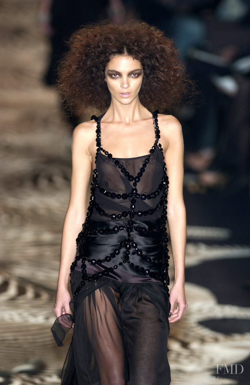 Mariacarla Boscono featured in  the Saint Laurent fashion show for Spring/Summer 2004