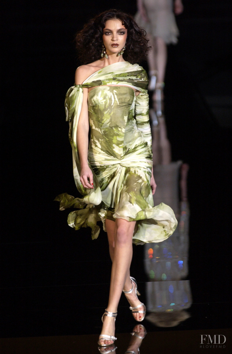 Mariacarla Boscono featured in  the Valentino Couture fashion show for Spring/Summer 2004