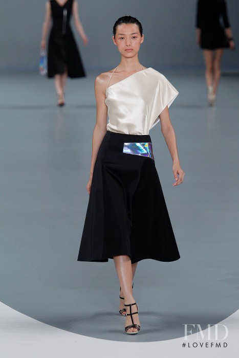 Tian Yi featured in  the HUGO fashion show for Spring/Summer 2013