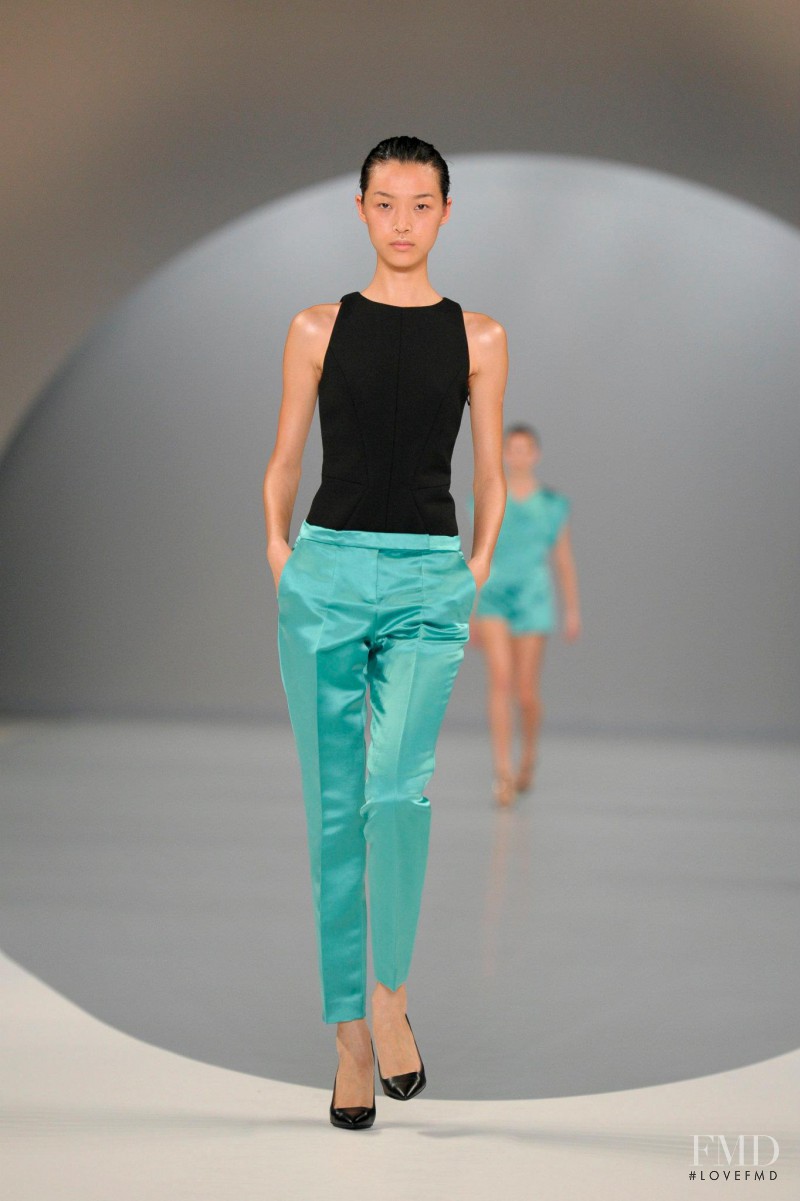 Tian Yi featured in  the HUGO fashion show for Spring/Summer 2013