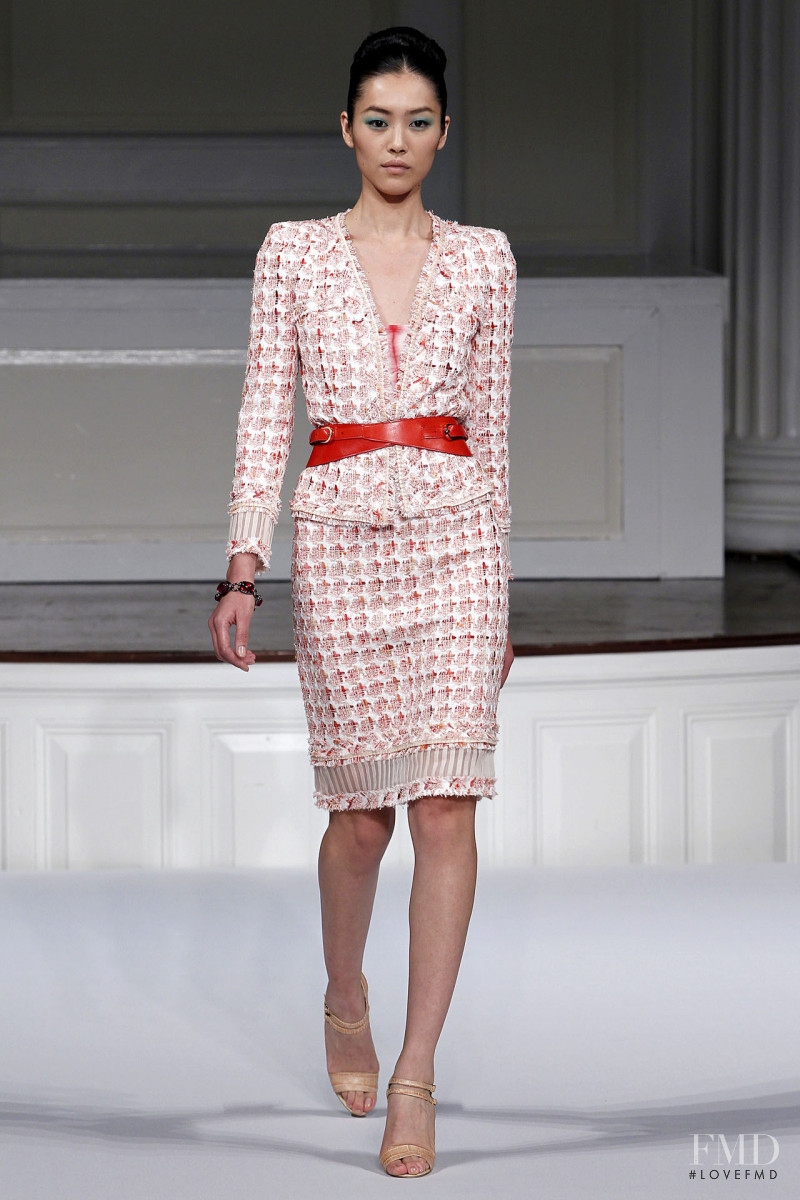 Liu Wen featured in  the Oscar de la Renta fashion show for Spring/Summer 2011
