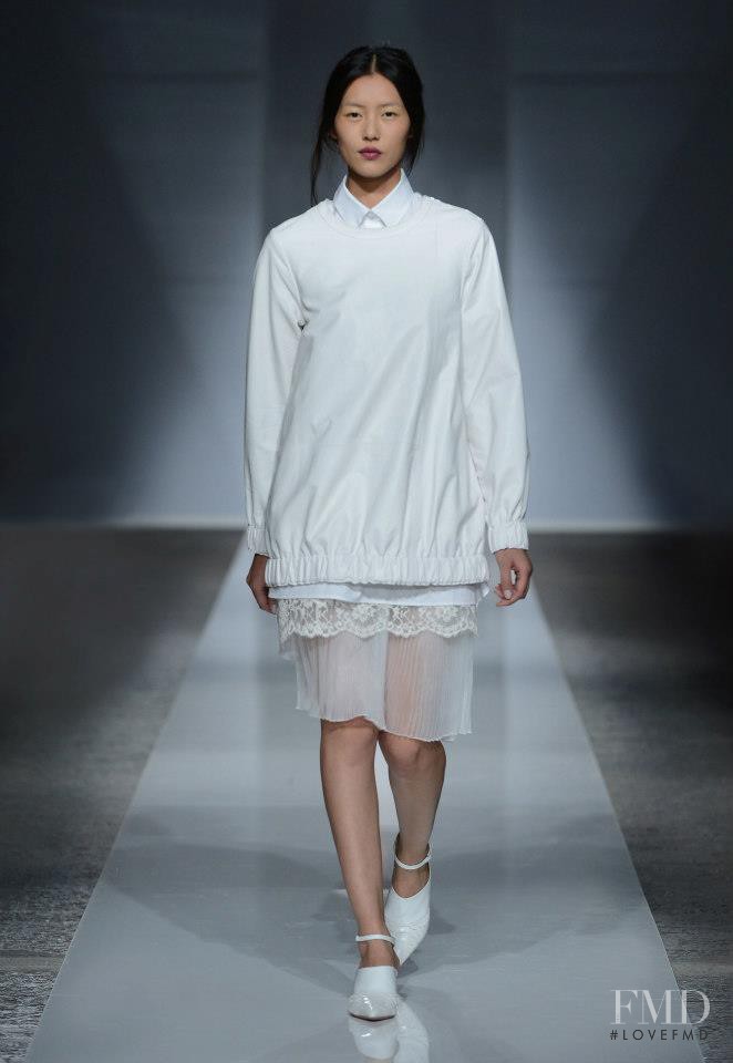 Liu Wen featured in  the Ports 1961 fashion show for Spring/Summer 2013