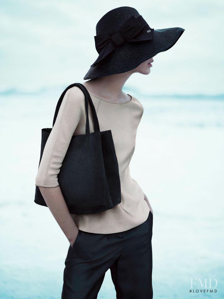 Milou van Groesen featured in  the Giorgio Armani advertisement for Spring/Summer 2012