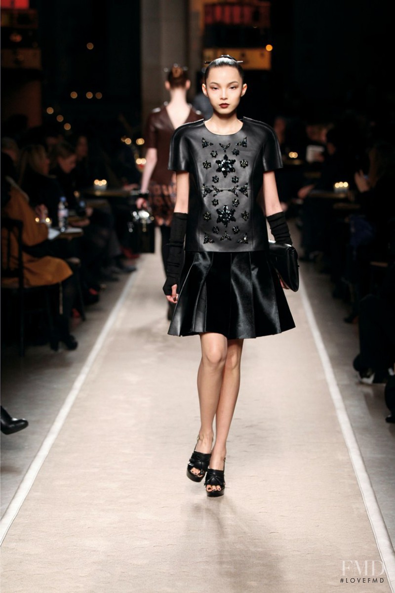 Xiao Wen Ju featured in  the Loewe fashion show for Autumn/Winter 2011