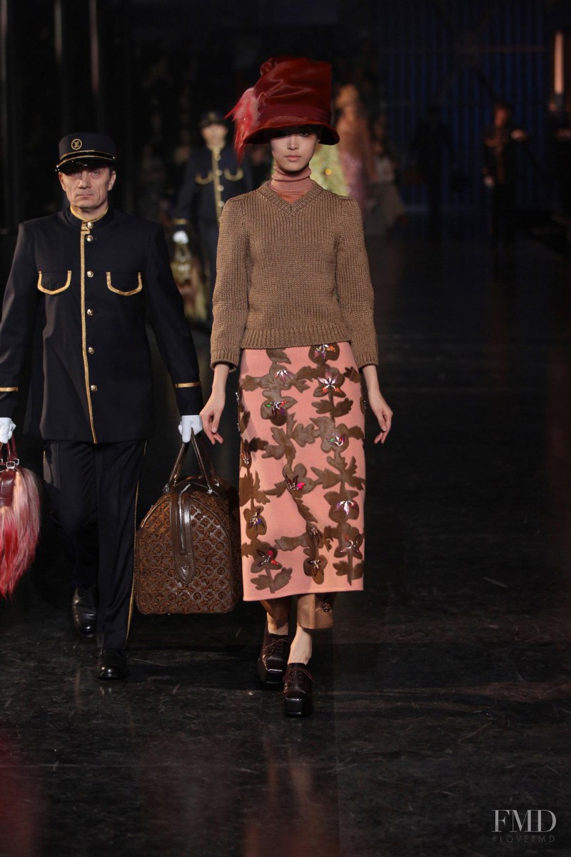 Tian Yi featured in  the Louis Vuitton fashion show for Autumn/Winter 2012