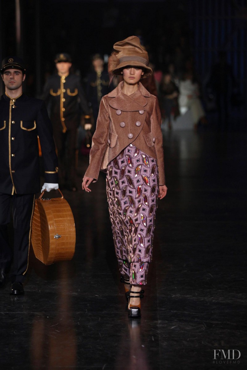 Lina Zhang featured in  the Louis Vuitton fashion show for Autumn/Winter 2012