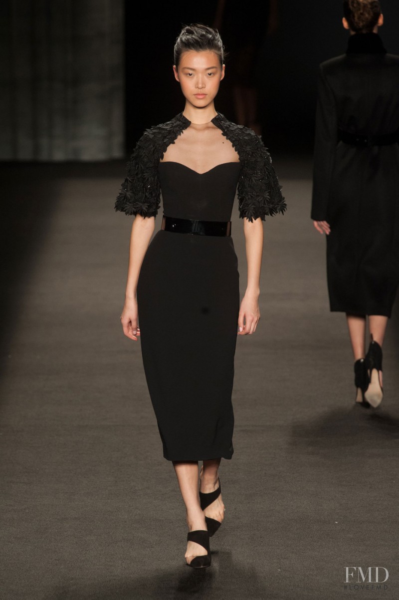 Tian Yi featured in  the Monique Lhuillier fashion show for Autumn/Winter 2014