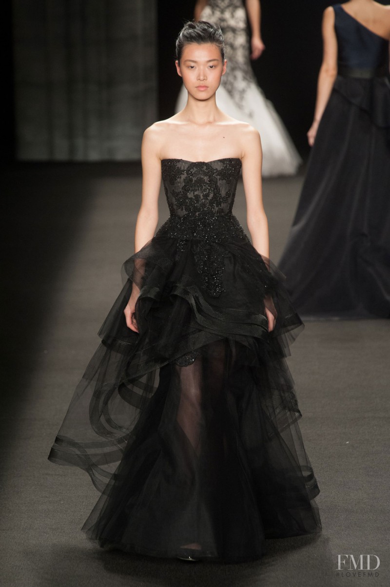 Tian Yi featured in  the Monique Lhuillier fashion show for Autumn/Winter 2014