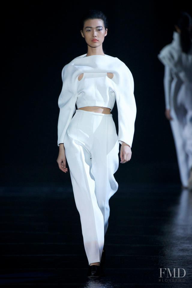 Tian Yi featured in  the Mugler fashion show for Autumn/Winter 2013