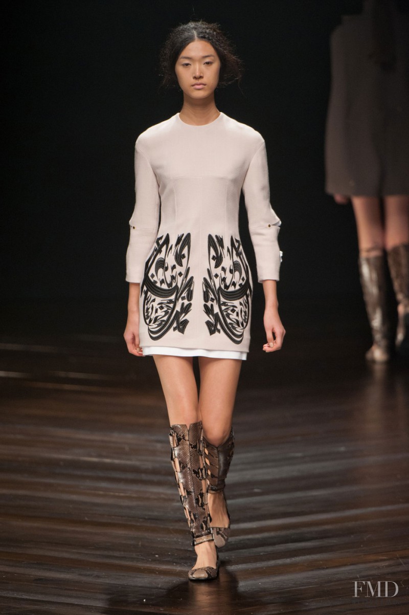 Tian Yi featured in  the Marios Schwab fashion show for Autumn/Winter 2013