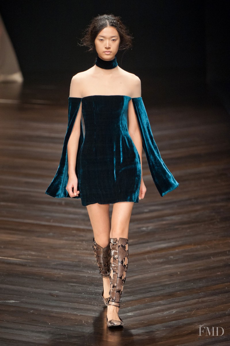 Tian Yi featured in  the Marios Schwab fashion show for Autumn/Winter 2013