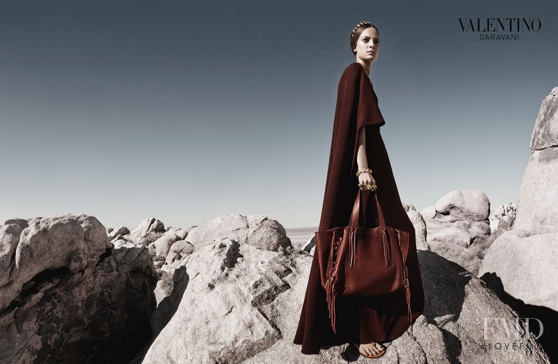 Ine Neefs featured in  the Valentino advertisement for Spring/Summer 2014