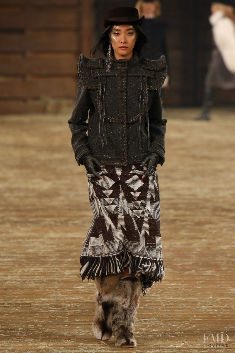 Ji Young Kwak featured in  the Chanel fashion show for Pre-Fall 2014