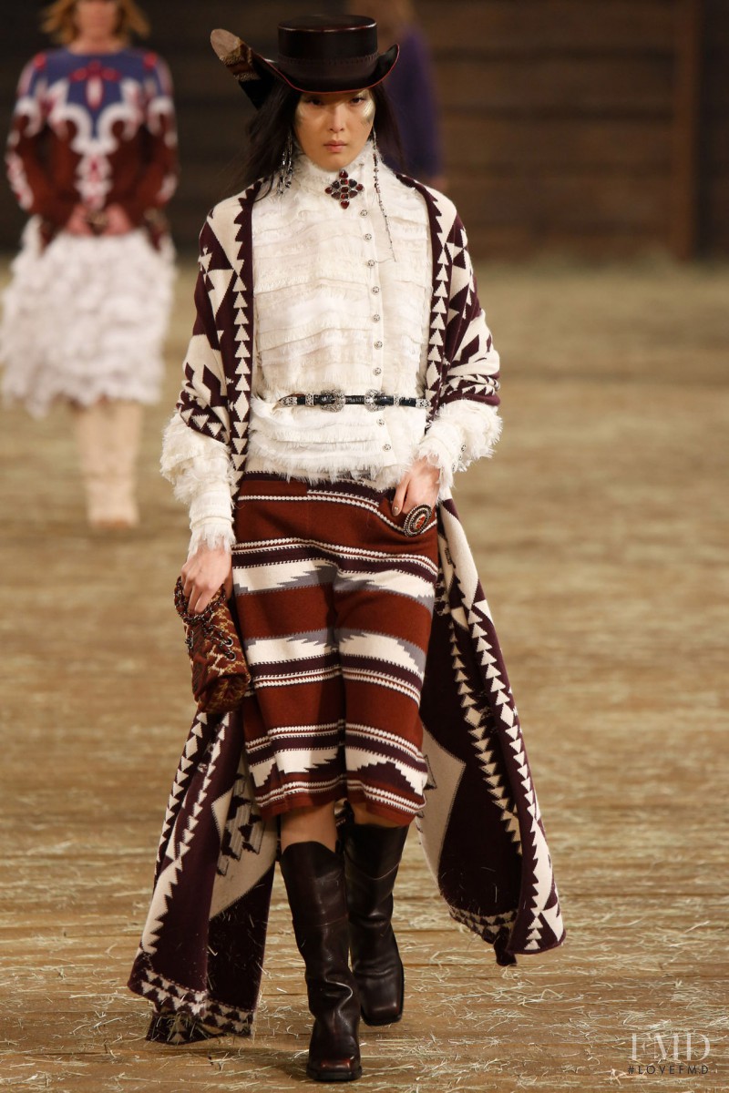 Sung Hee Kim featured in  the Chanel fashion show for Pre-Fall 2014