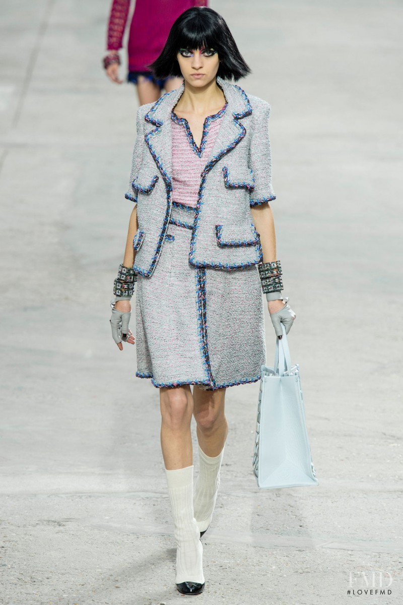 Magda Laguinge featured in  the Chanel fashion show for Spring/Summer 2014