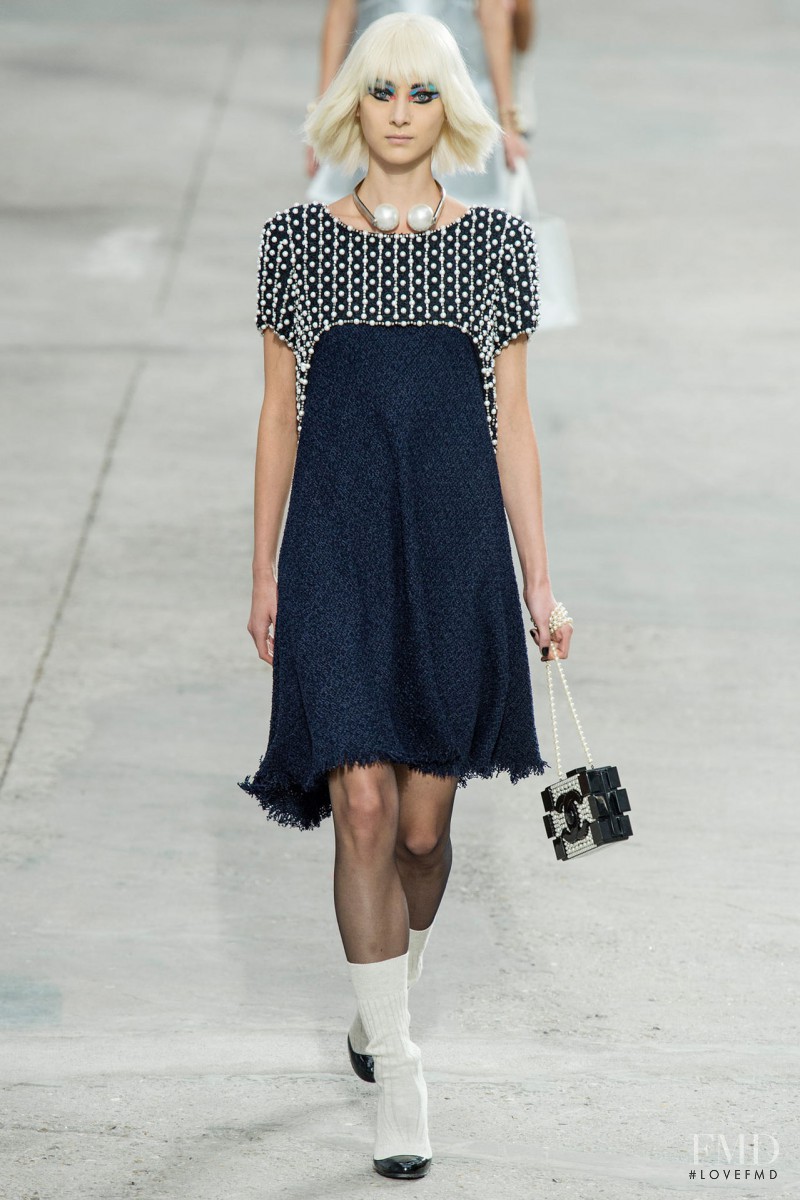 Evelina Szamszoncsik featured in  the Chanel fashion show for Spring/Summer 2014