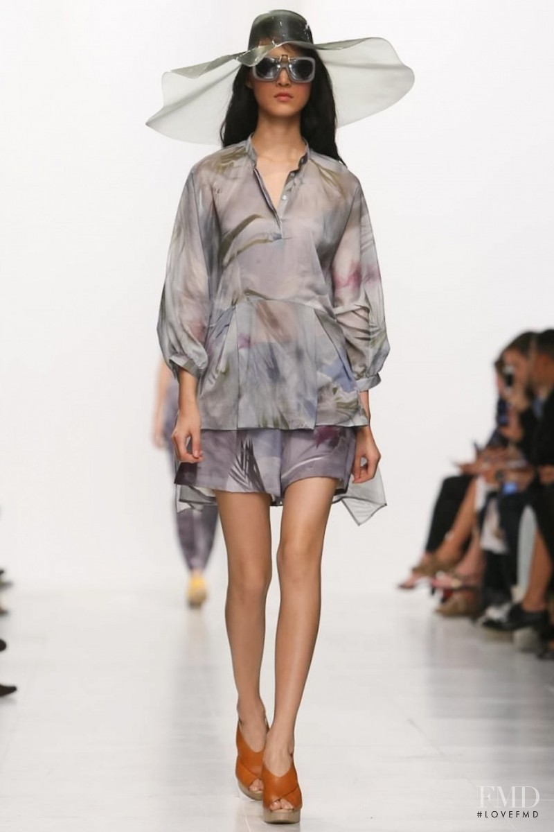Tian Yi featured in  the Hussein Chalayan fashion show for Spring/Summer 2014