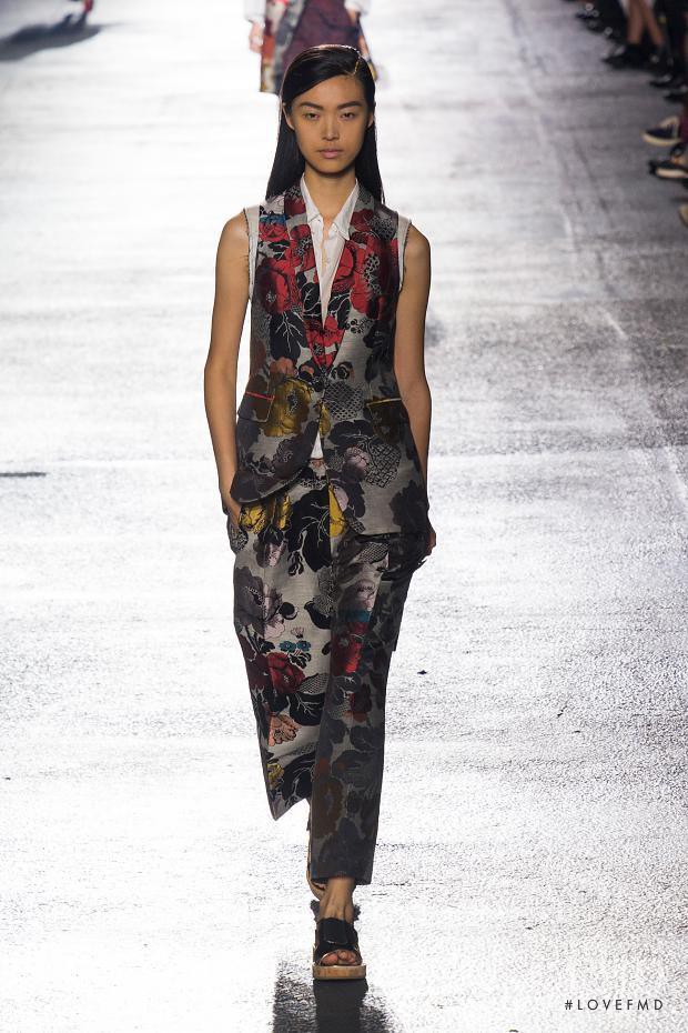 Tian Yi featured in  the Dries van Noten fashion show for Spring/Summer 2014