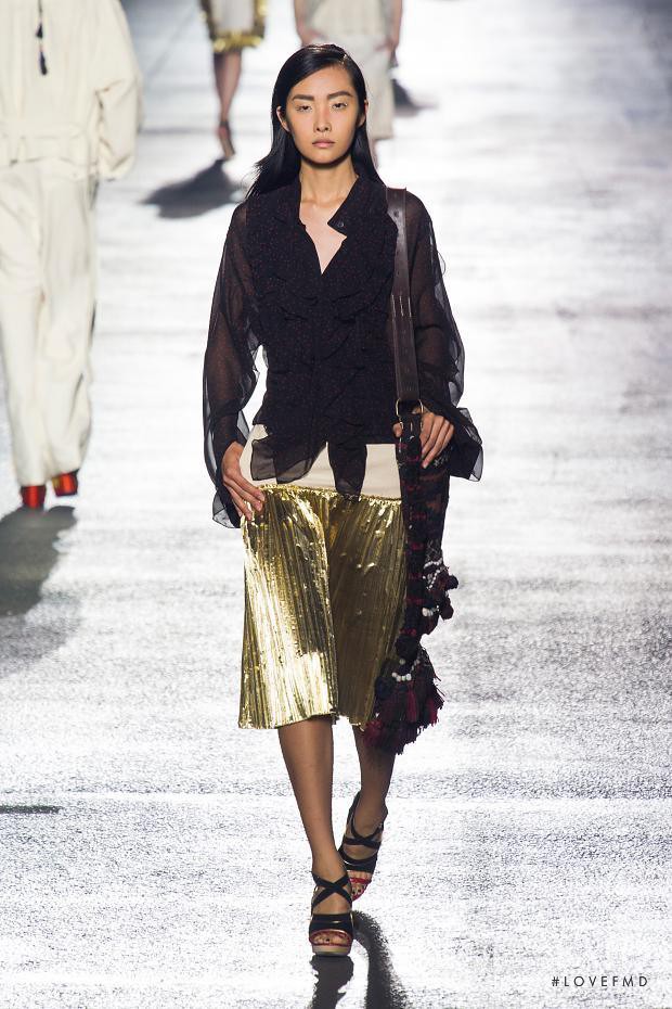 Ji Young Kwak featured in  the Dries van Noten fashion show for Spring/Summer 2014