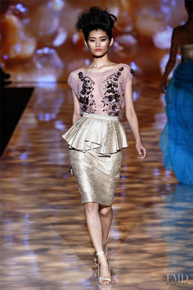 Ming Xi featured in  the Badgley Mischka fashion show for Spring/Summer 2012