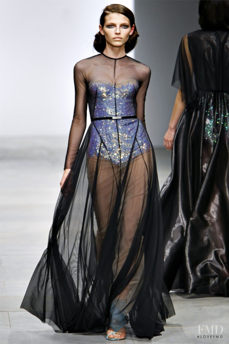 Karlina Caune featured in  the Marios Schwab fashion show for Spring/Summer 2012