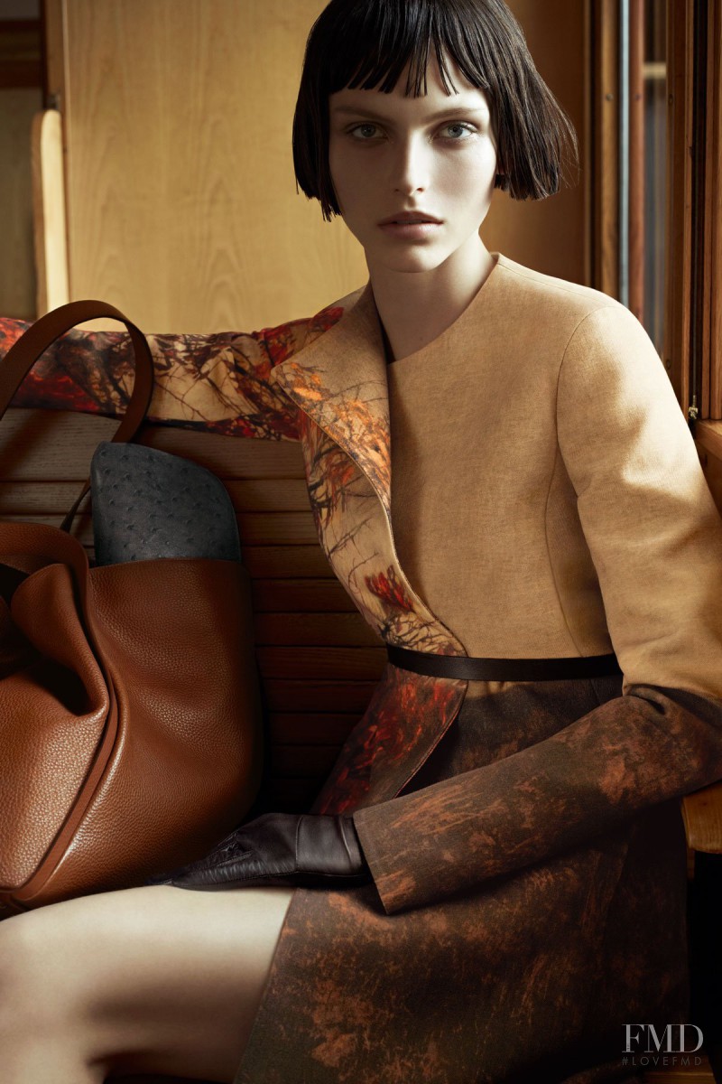 Karlina Caune featured in  the Akris advertisement for Pre-Fall 2012