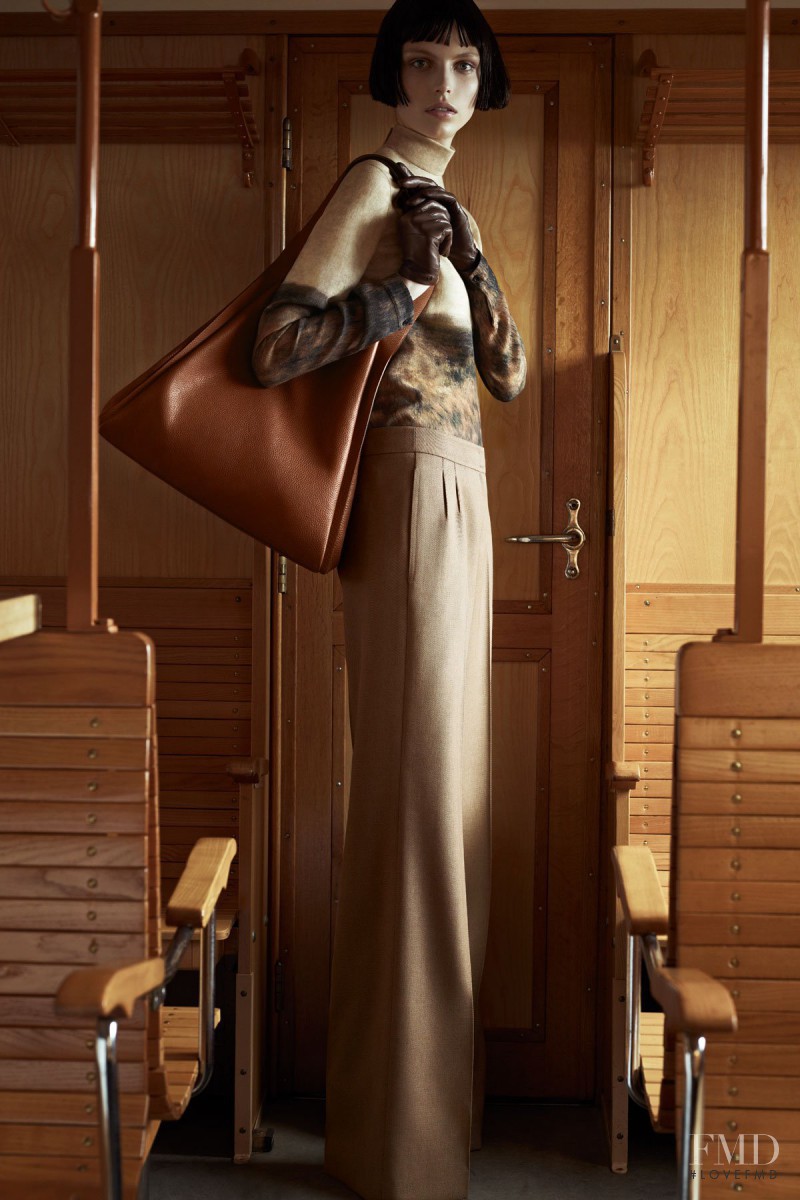 Karlina Caune featured in  the Akris advertisement for Pre-Fall 2012