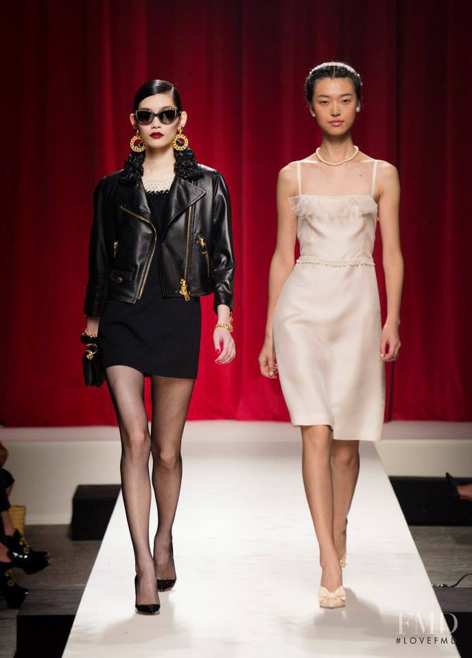 Ming Xi featured in  the Moschino fashion show for Spring/Summer 2014