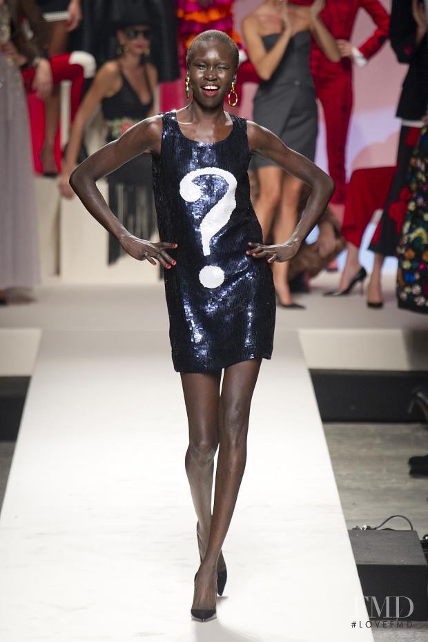 Alek Wek featured in  the Moschino fashion show for Spring/Summer 2014