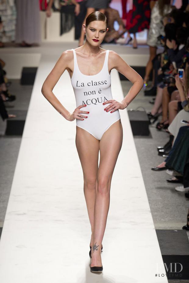 Catherine McNeil featured in  the Moschino fashion show for Spring/Summer 2014