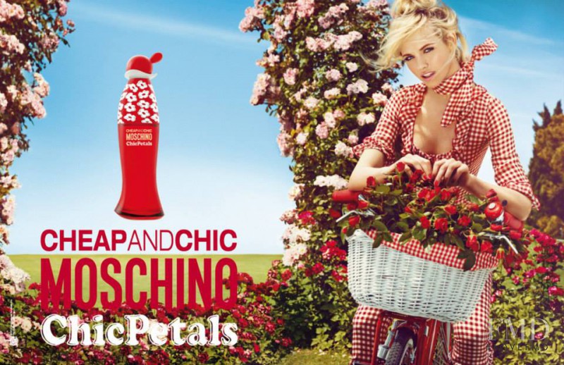Ginta Lapina featured in  the Boutique Moschino  "Chic Petals" advertisement for Spring/Summer 2016