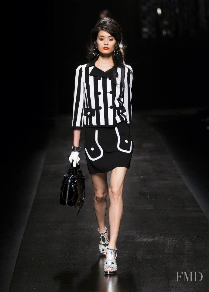 Ming Xi featured in  the Moschino fashion show for Spring/Summer 2013