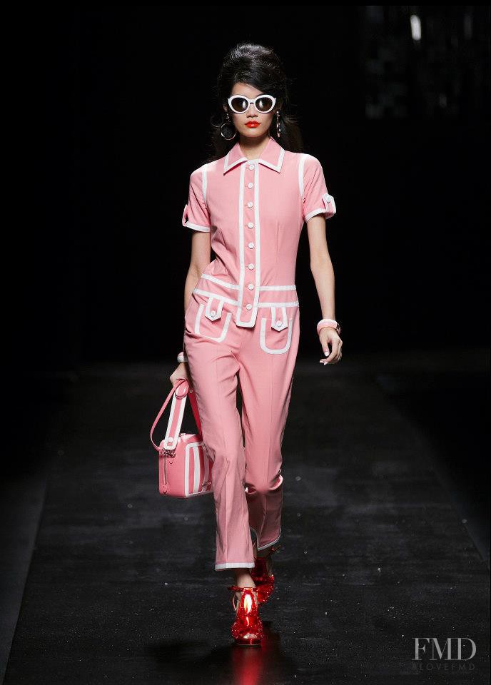 Ming Xi featured in  the Moschino fashion show for Spring/Summer 2013