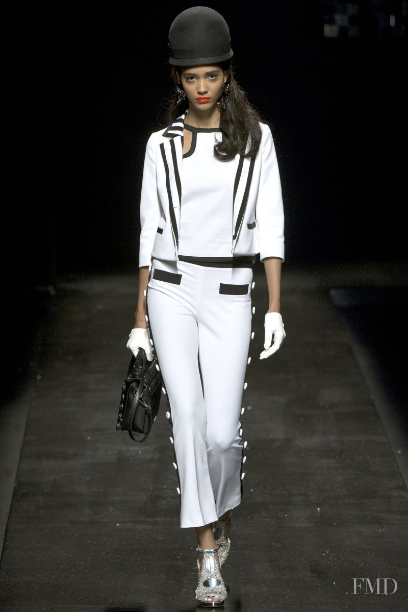 Cora Emmanuel featured in  the Moschino fashion show for Spring/Summer 2013