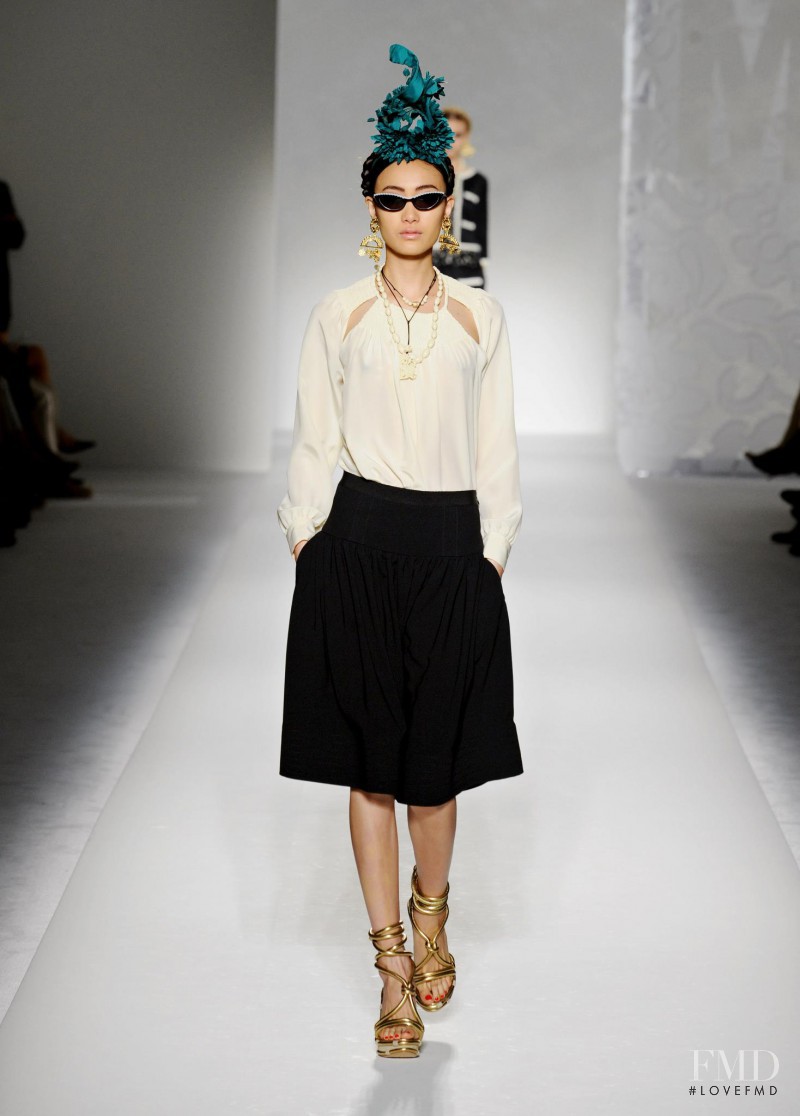 Shu Pei featured in  the Moschino fashion show for Spring/Summer 2012