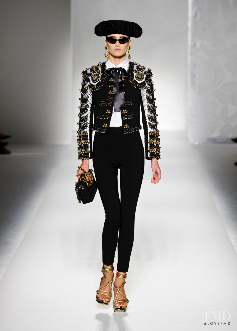 Karmen Pedaru featured in  the Moschino fashion show for Spring/Summer 2012