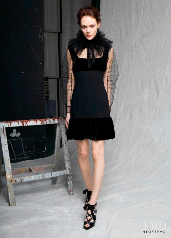 Kinga Rajzak featured in  the Moschino fashion show for Pre-Fall 2012