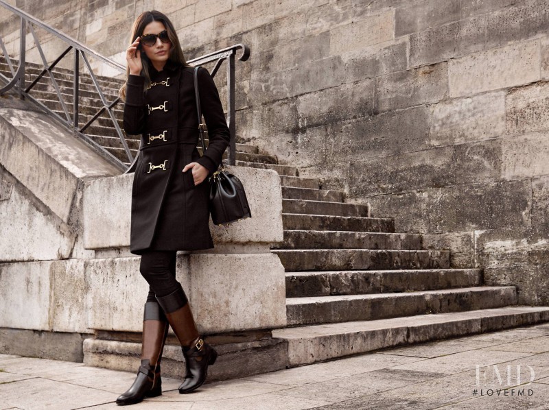 Lily Aldridge featured in  the Michael Kors Collection Jet Set Campaign advertisement for Autumn/Winter 2015