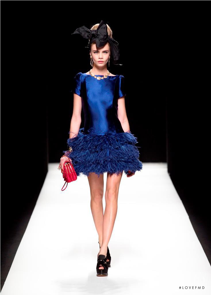 Cara Delevingne featured in  the Moschino fashion show for Autumn/Winter 2012