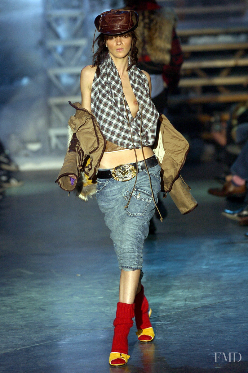 Mariacarla Boscono featured in  the DSquared2 fashion show for Autumn/Winter 2004